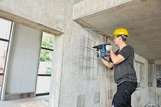 Bosch 18V Tool Set 2 Pieces: GWS 18V-10 P Angle Grinder + GBH 18V-26 Rotary Hammer with 2x 5.5Ah Batteries