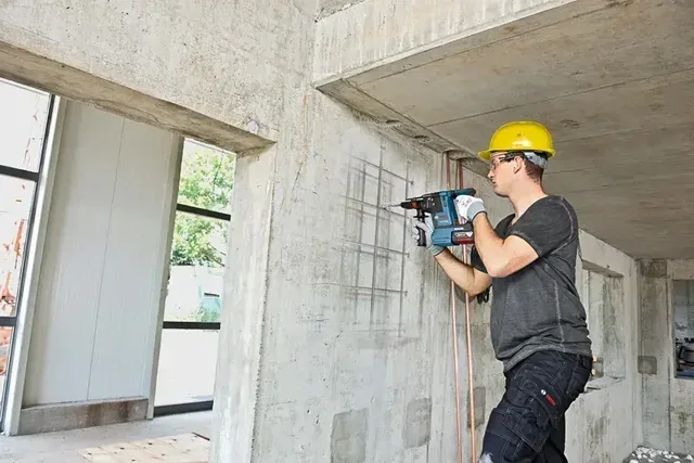 Bosch 18V Tool Set 2 Pieces: GWS 18V-10 P Angle Grinder + GBH 18V-26 Rotary Hammer with 2x 5.5Ah Batteries