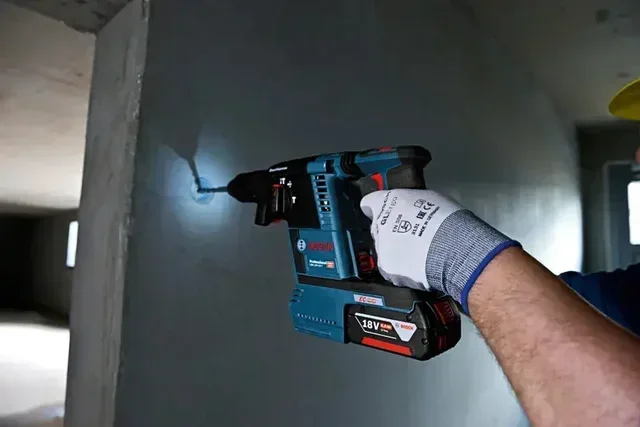 Bosch 18V Tool Set 2 Pieces: GWS 18V-10 P Angle Grinder + GBH 18V-26 Rotary Hammer with 2x 5.5Ah Batteries