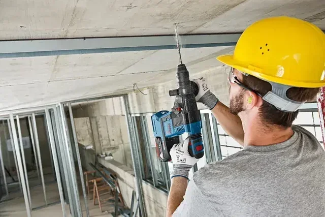 Bosch 18V Tool Set 2 Pieces: GWS 18V-10 P Angle Grinder + GBH 18V-26 Rotary Hammer with 2x 5.5Ah Batteries