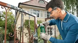 Bosch PWS 850-125 Angle Grinder 850W with SystemBox M - Corded Electric Grinding Tool